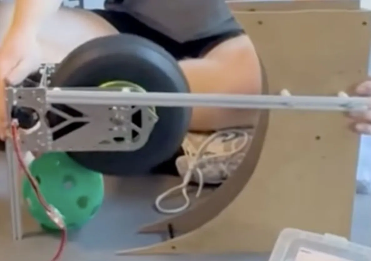Flywheel launcher prototype with tire